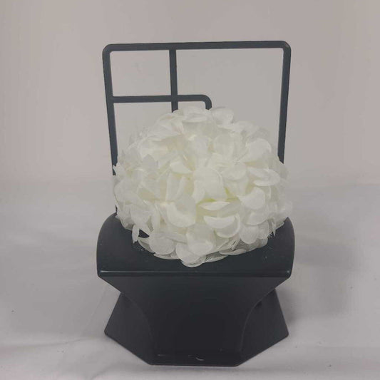 FAUX WHITE FLOWER IN BLACK STAND