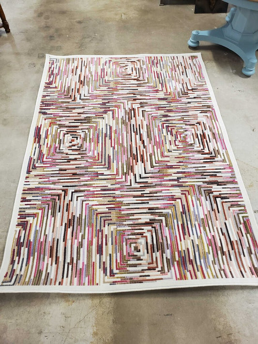 5'3" X 7'6" MULTI COLOUR AREA RUG