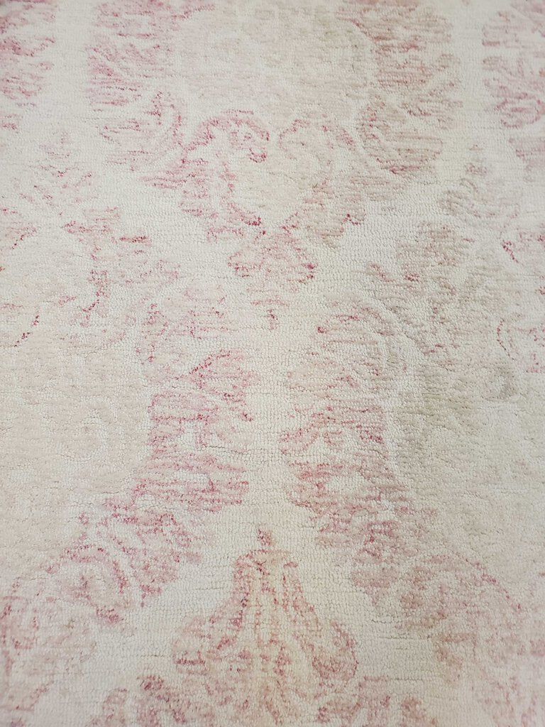 61" X 96" PINK & CREAM AREA RUG