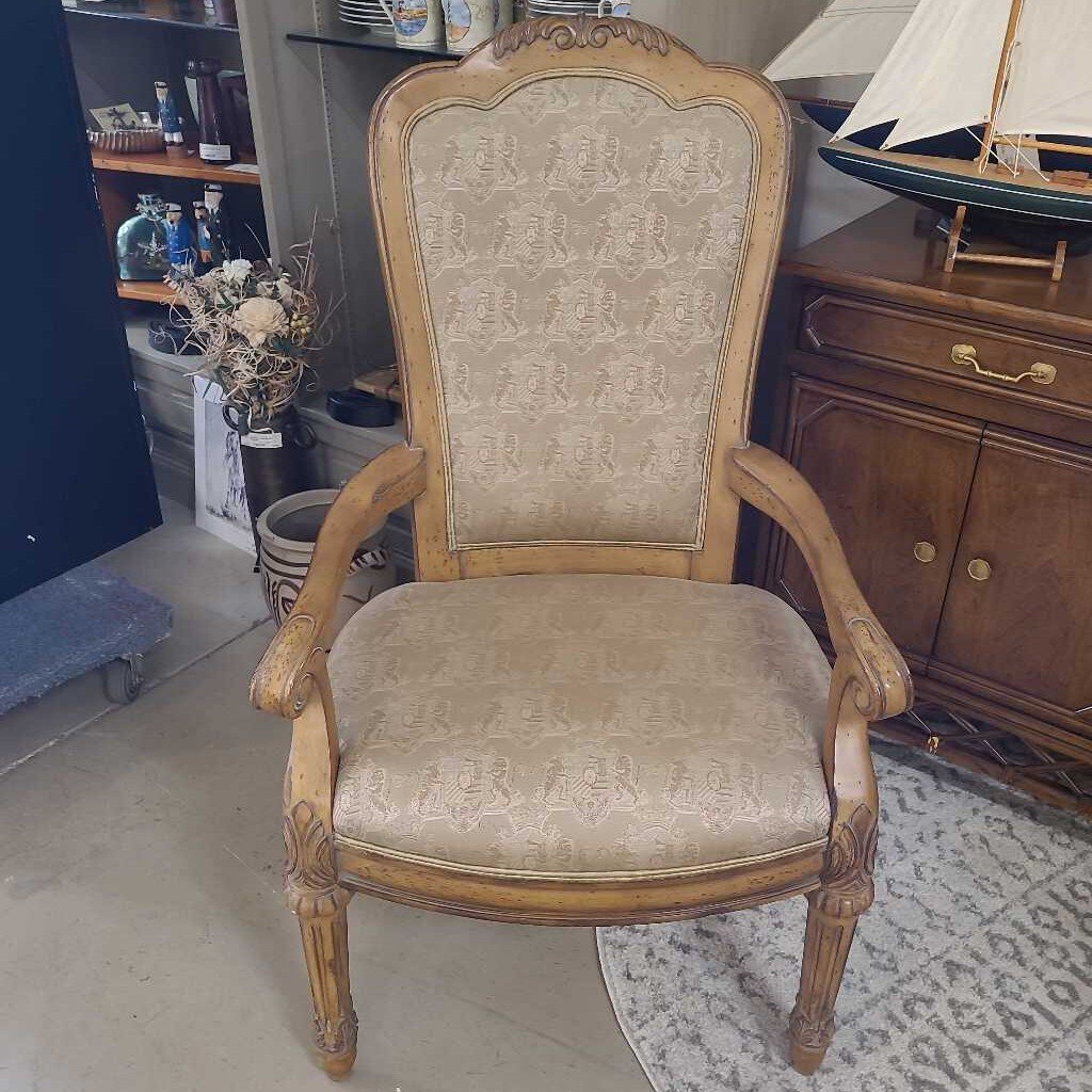 BEIGE CARVED WOOD ARM CHAIR