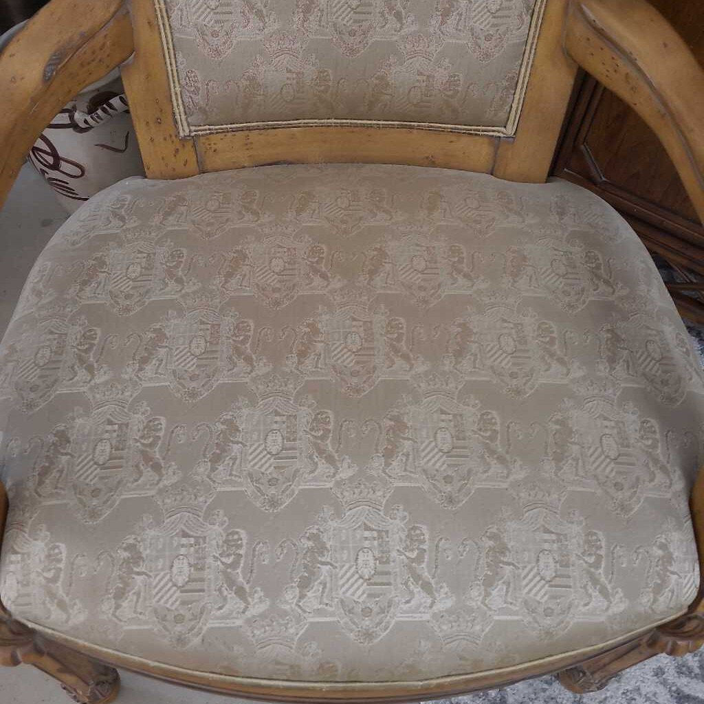 BEIGE CARVED WOOD ARM CHAIR