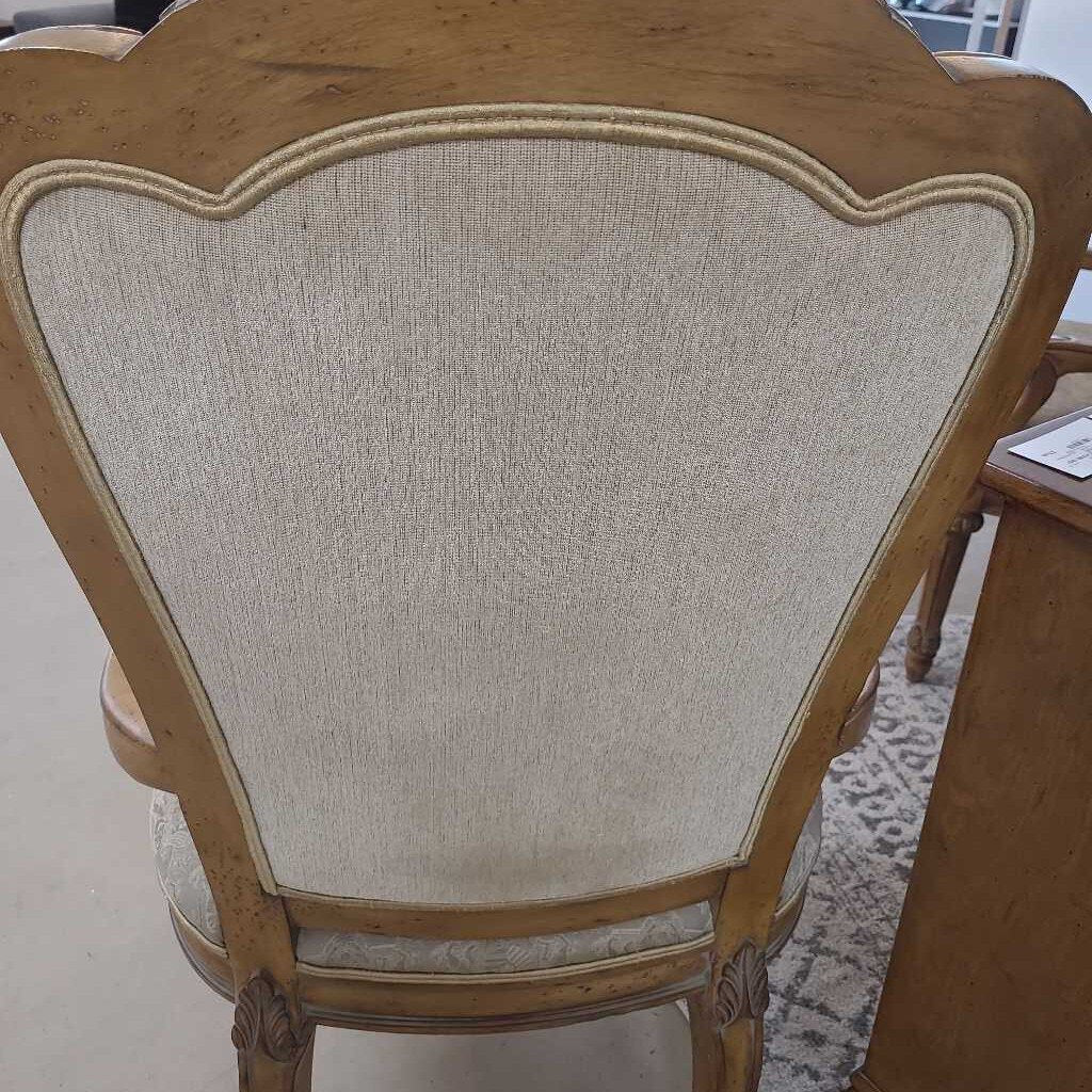 BEIGE CARVED WOOD ARM CHAIR