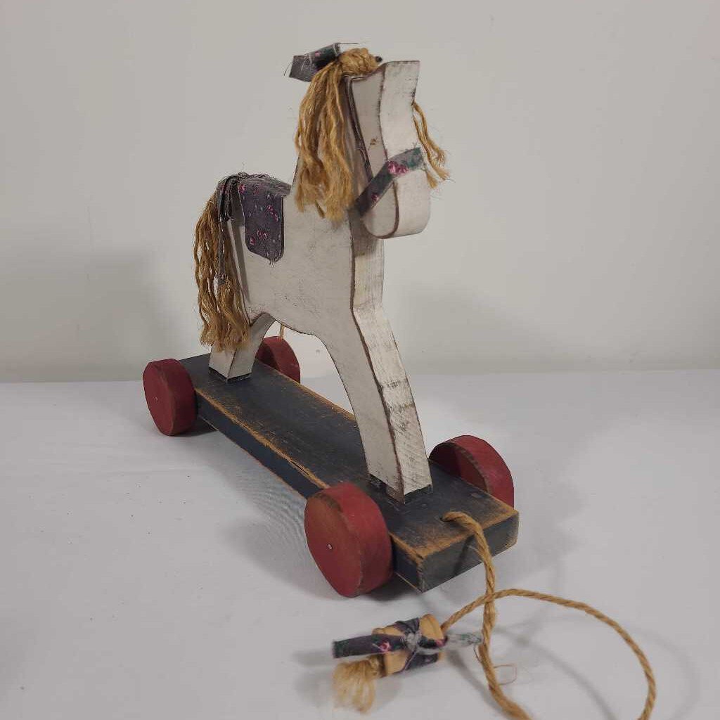 WOODEN ROCKING HORSE ON WHEELS